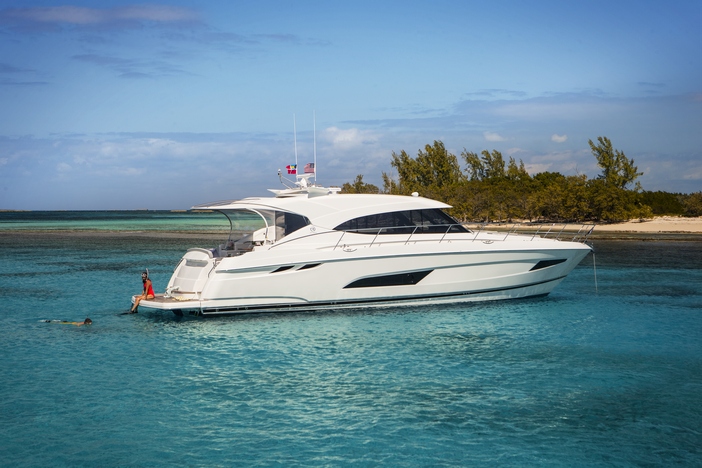 Riviera's 5400 Sport Yacht's hydraulic swim platform is the perfect platform for snorkelling or simply relaxing and soaking up the sun.